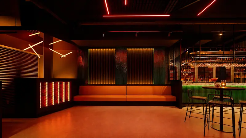 Long leather bench beside the bar